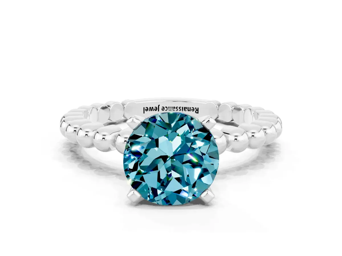 Round Cut Blue Topaz Solitaire Ring with Beaded Band and Prong Setting Silver