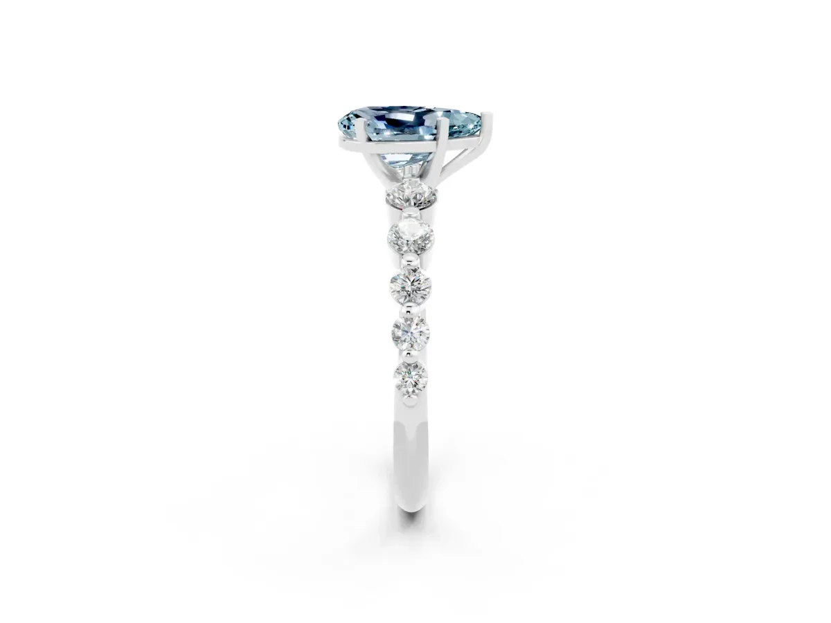 Pear Cut Solitaire Aquamarine Ring with Pave Band and Four-Prong Setting Silver