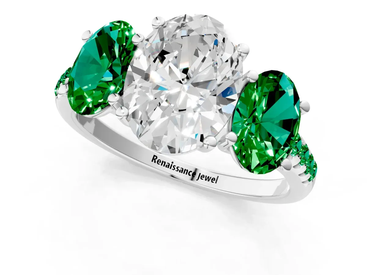 Three-Stone Oval Cut Diamond Ring with Round Emerald Pavé Band and Prong Setting Platinum