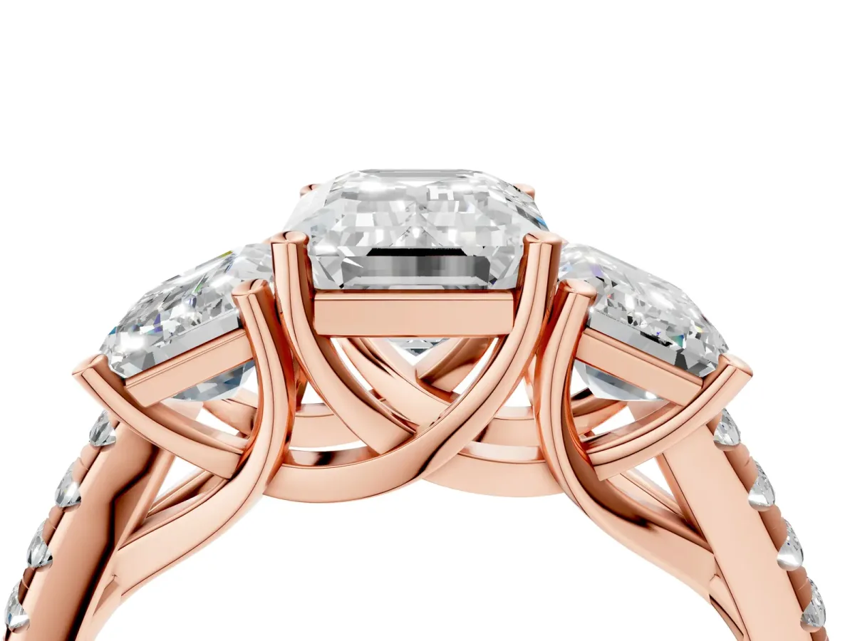 Three-Stone Emerald Cut Diamond Ring with Round Pavé Band and Prong Setting Rose gold
