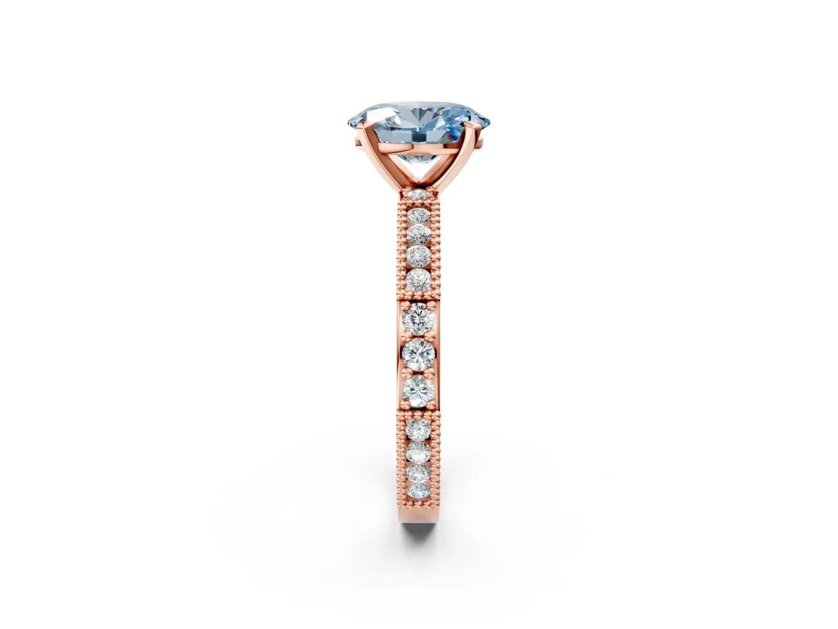 Fancy Blue Oval Cut Solitaire with Pavé Band and Four-Prong Setting Rose gold