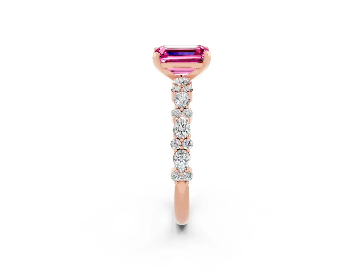 Emerald Cut Pink Sapphire Side Stone Solitaire Ring with Round and Four-Prong Setting Rose gold