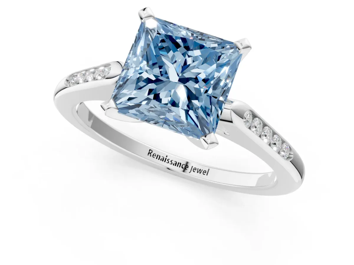 Fancy Blue Princess Cut Diamond Solitaire Ring with Channel Set Round Band and Prong Setting Silver