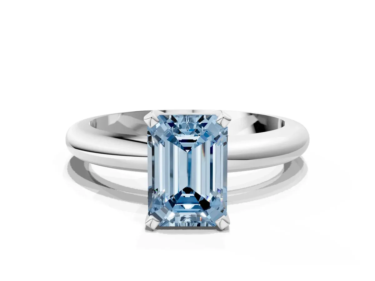 Fancy Blue Emerald Cut Diamond Solitaire Engagement Ring with Round Band and Four-Prong Setting Silver