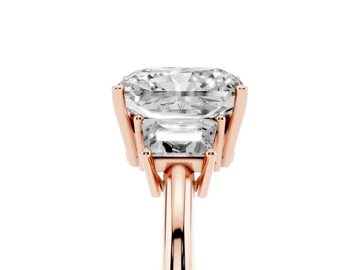 Radiant Cut Diamond Three-Stone Ring with Trapezoid Side Stones and Prong Setting Rose gold