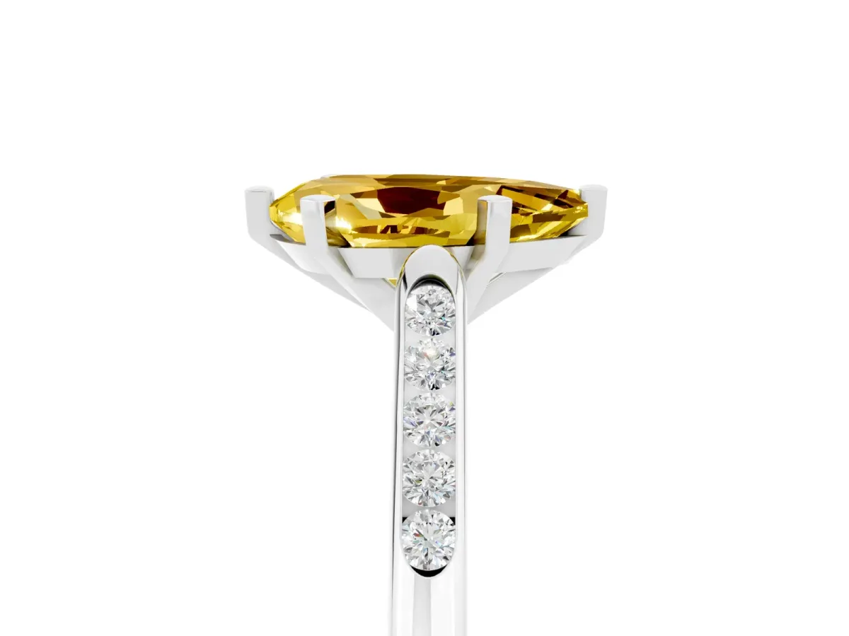 Pear Cut Yellow Sapphire Solitaire Ring with Channel Set Round Band and Prong Setting Silver