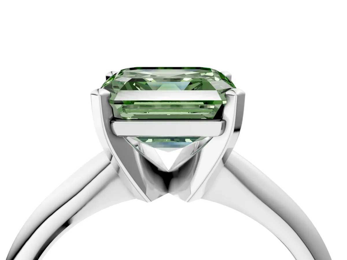 Fancy Green Asscher Cut Cut Solitaire Ring with Four-Prong Setting on a Classic Band Platinum