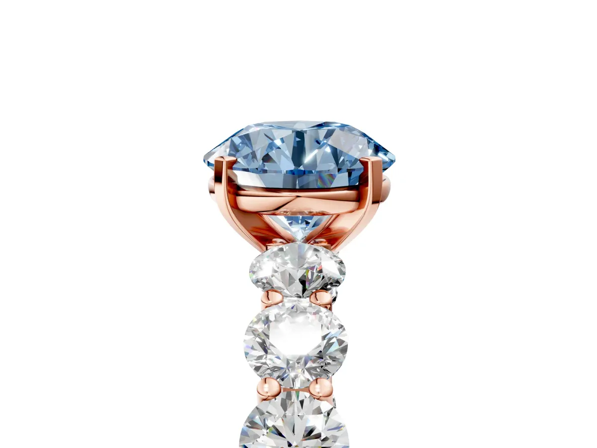 Fancy Blue Round Cut Diamond Prong Setting with Side Stones on a Pave Band Rose gold