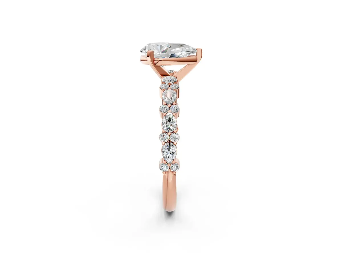 Pear Cut Diamond Side Stone Solitaire Ring with Round and Four-Prong Setting Rose gold