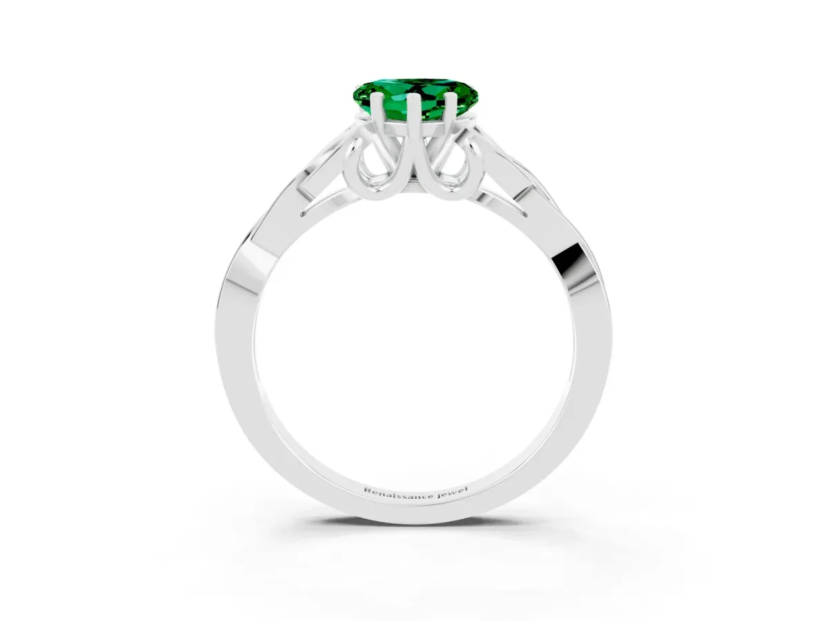 Heart Cut Emerald Solitaire Engagement Ring with Celtic Knot Band and Four-Prong Setting Silver