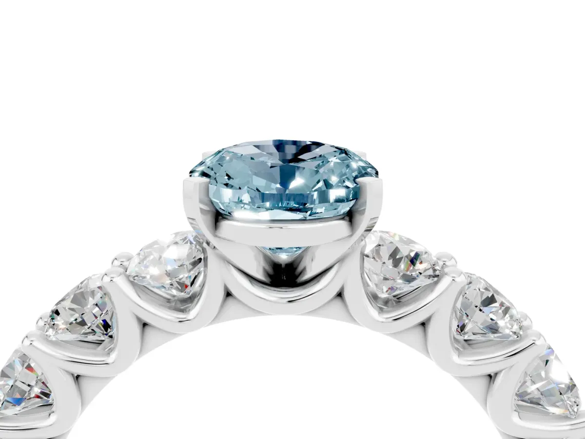 Oval Cut Aquamarine Prong Setting with Side Stones on a Pave Band Silver
