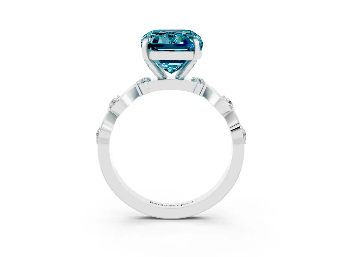 Emerald Cut Blue Topaz Solitaire Twisted Band with Round Accents and Prong Setting Silver