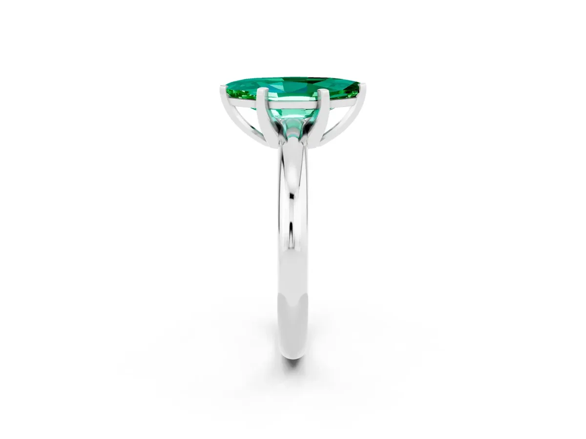 Marquise Cut Emerald Solitaire Engagement Ring with Round Band and Four-Prong Setting Silver