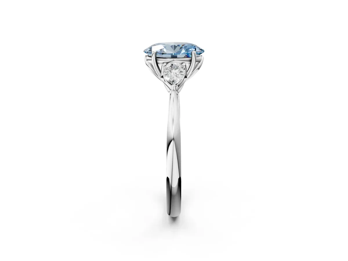 Fancy Blue Three-Stone Oval Cut Diamond Ring with Pear Side Stones in Four-Prong Setting White gold