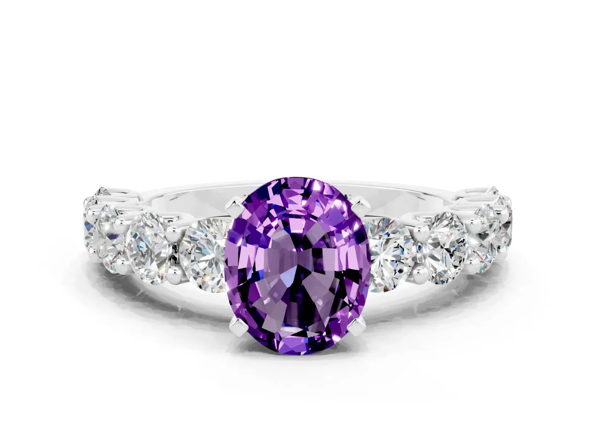 Oval Cut Amethyst Prong Setting with Side Stones on a Pave Band Silver