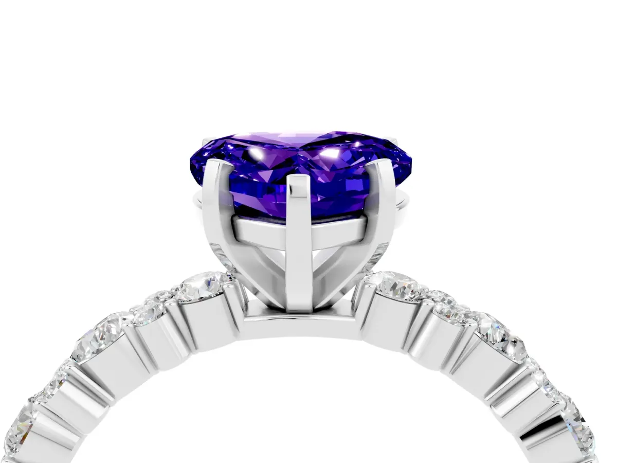 Heart Cut Tanzanite Side Stone Solitaire Ring with Round and Four-Prong Setting Platinum