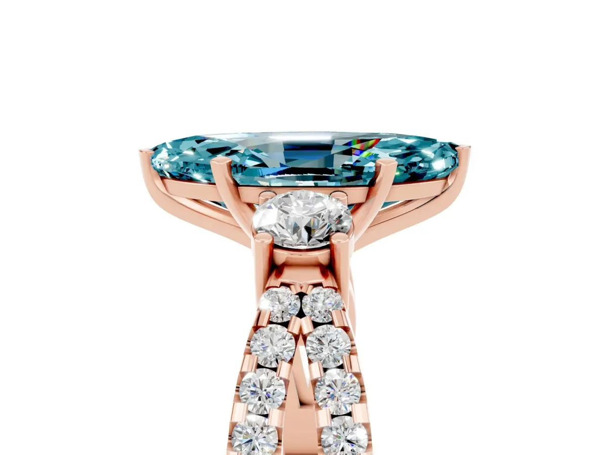 Marquise Cut Blue Topaz Three-Stone Ring with Pavé Split Shank and Four-Prong Setting Rose gold