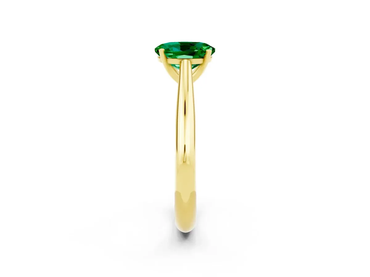 Oval Cut Emerald Solitaire Engagement Ring with Cathedral Setting and Four-Prong Mount Yellow gold