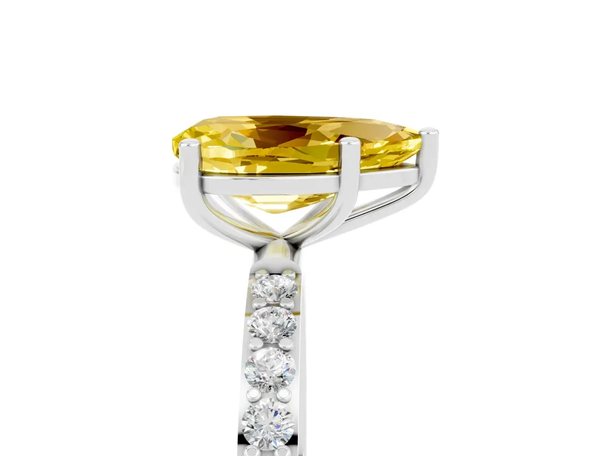 Pear Cut Yellow Sapphire Solitaire Ring with Round Pavé Band and Prong Setting Silver