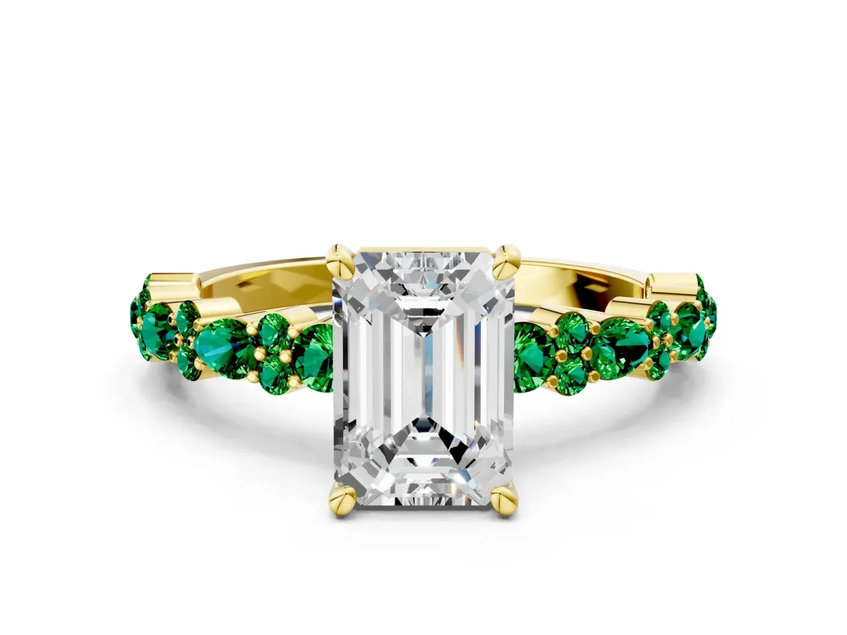 Emerald Cut Diamond Side Stone Solitaire Ring with Round Emerald and Four-Prong Setting Yellow gold