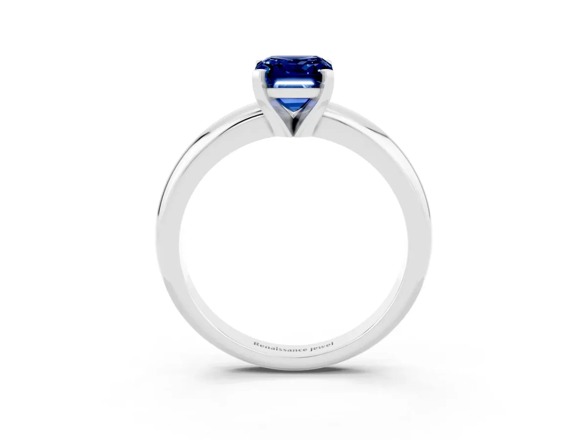 Emerald Cut Blue Sapphire Solitaire Engagement Ring with Round Band and Four-Prong Setting Silver