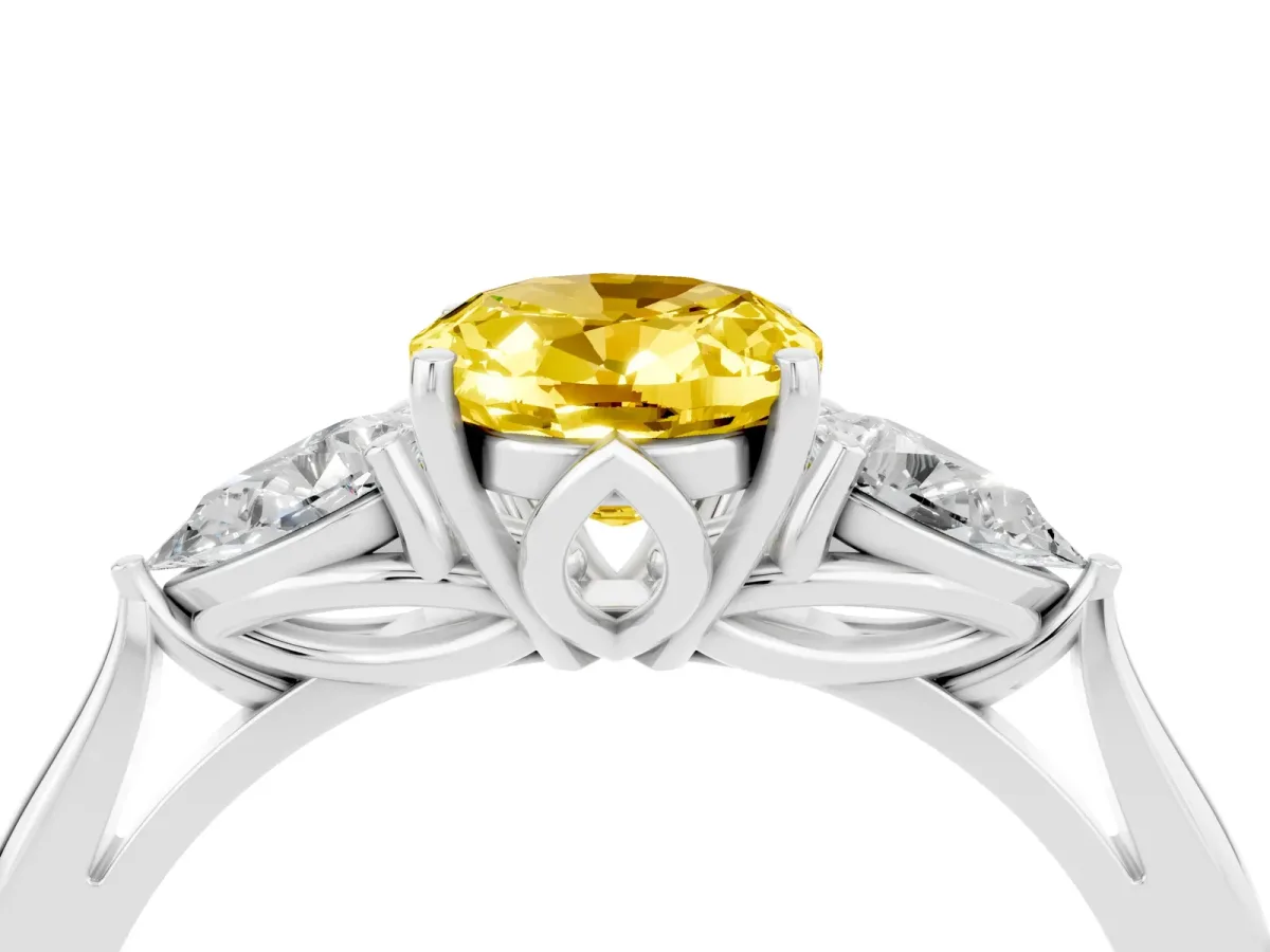 Three-Stone Oval Cut Yellow Sapphire Ring with Pear Side Stones in Four-Prong Setting White gold