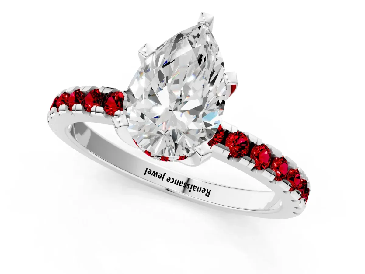 Pear Cut Diamond Solitaire Ring with Round Ruby Pavé Band and Four-Prong Setting White gold