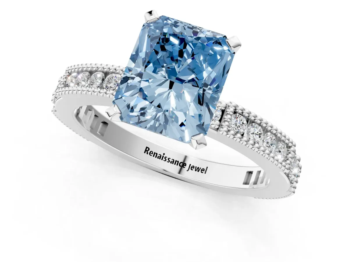 Fancy Blue Radiant Cut Solitaire with Pavé Band and Four-Prong Setting Silver