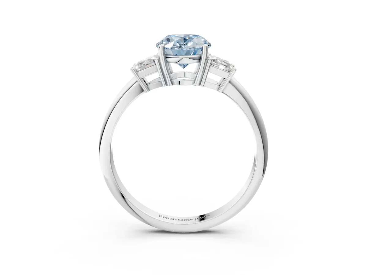 Fancy Blue Oval Cut Diamond Three-Stone Ring with Trapezoid Side Stones and Prong Setting White gold