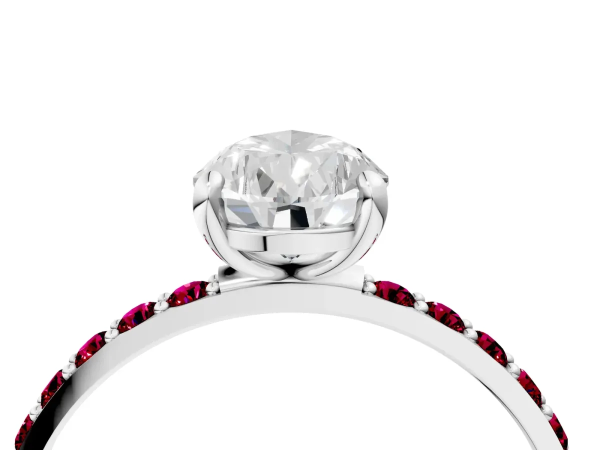 Pear Cut Diamond Solitaire Ring with Round Garnet Pavé Band and Prong Setting Silver