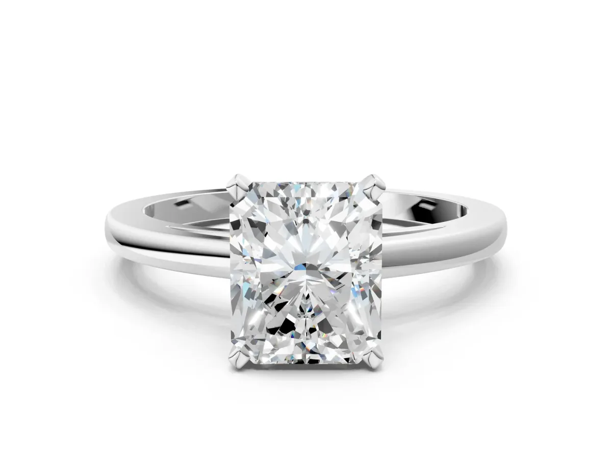 Radiant Cut Solitaire Diamond Engagement Ring with Four-Prong Setting on a Classic Band Platinum
