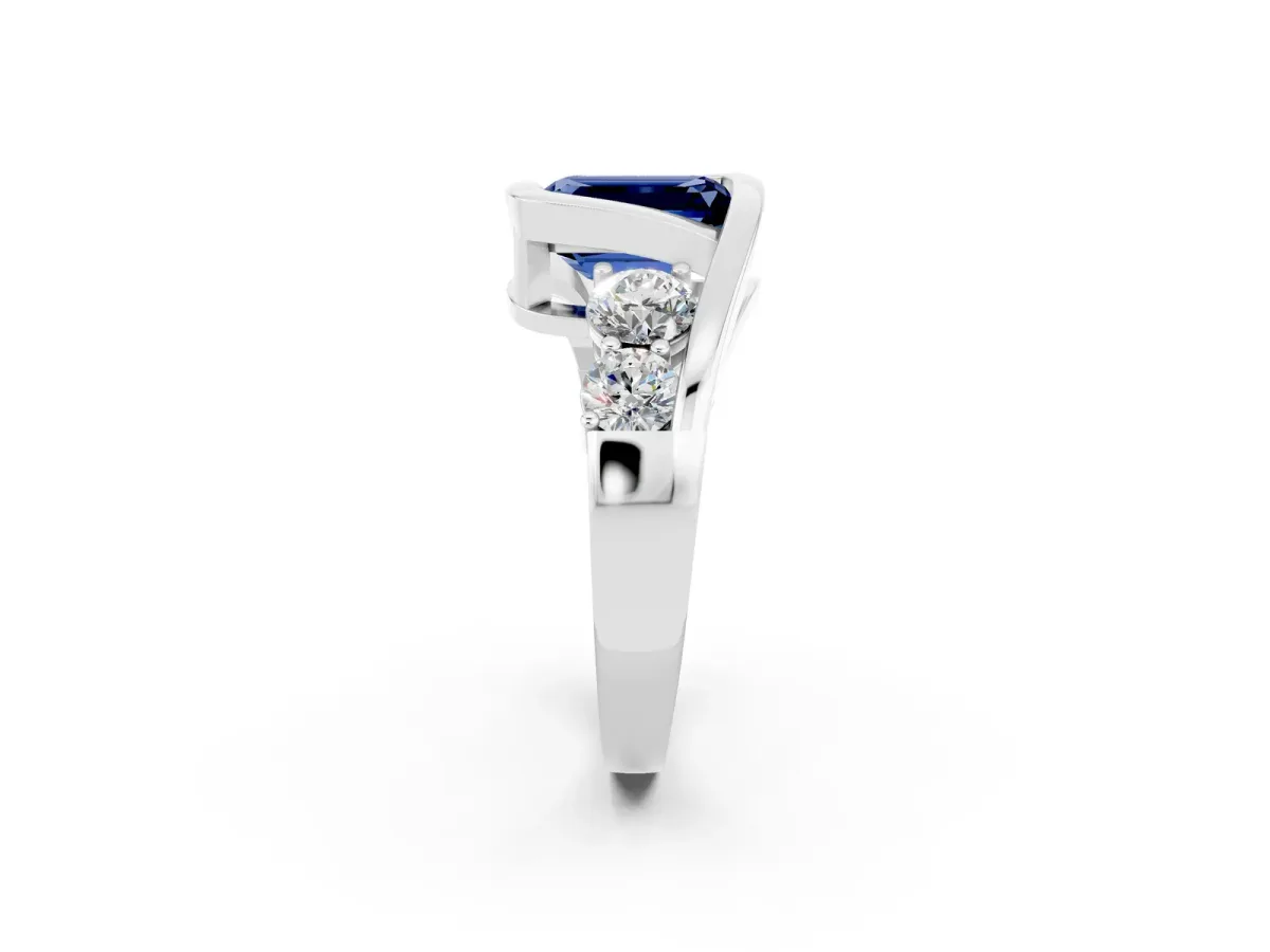 Bezel Set Emerald Cut Blue Sapphire Bypass Ring with Round Accents Platinum