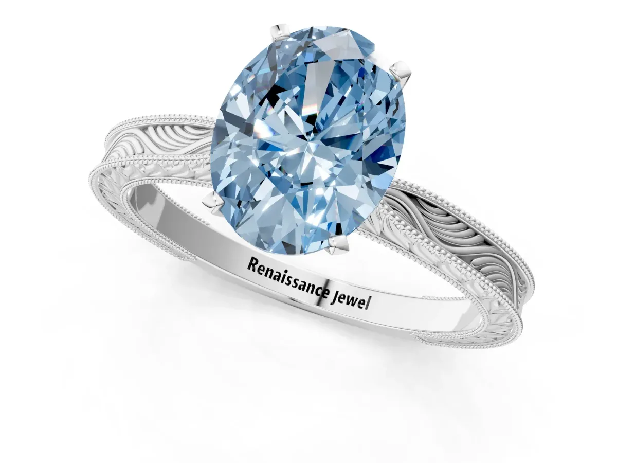 Fancy Blue Oval Cut Solitaire Milgrain Engraved Band with Four-Prong Setting White gold