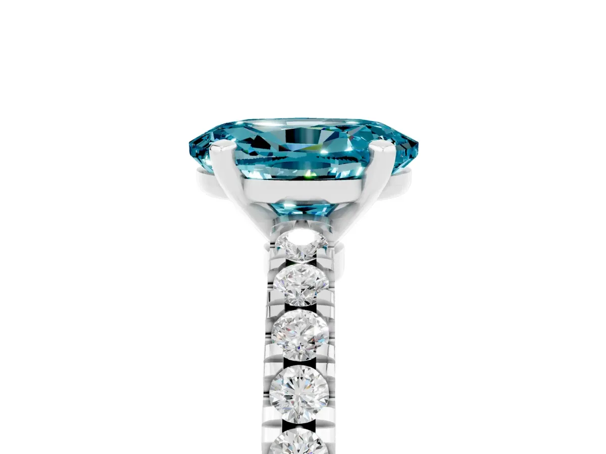 Oval Cut Solitaire Blue Topaz with Pavé Band and Four-Prong Setting Silver