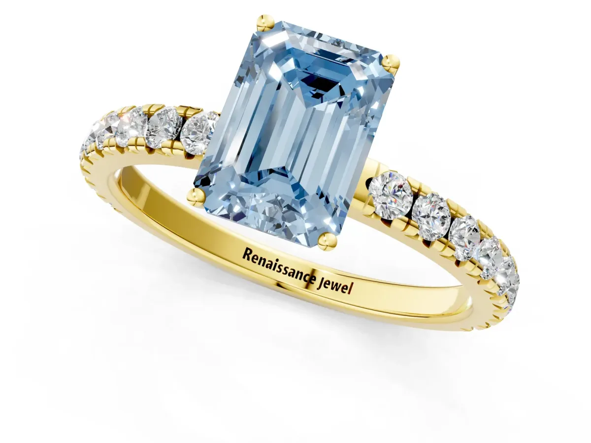 Fancy Blue Emerald Cut Diamond Pavé Solitaire Engagement Ring with Four-Prong Setting Yellow gold
