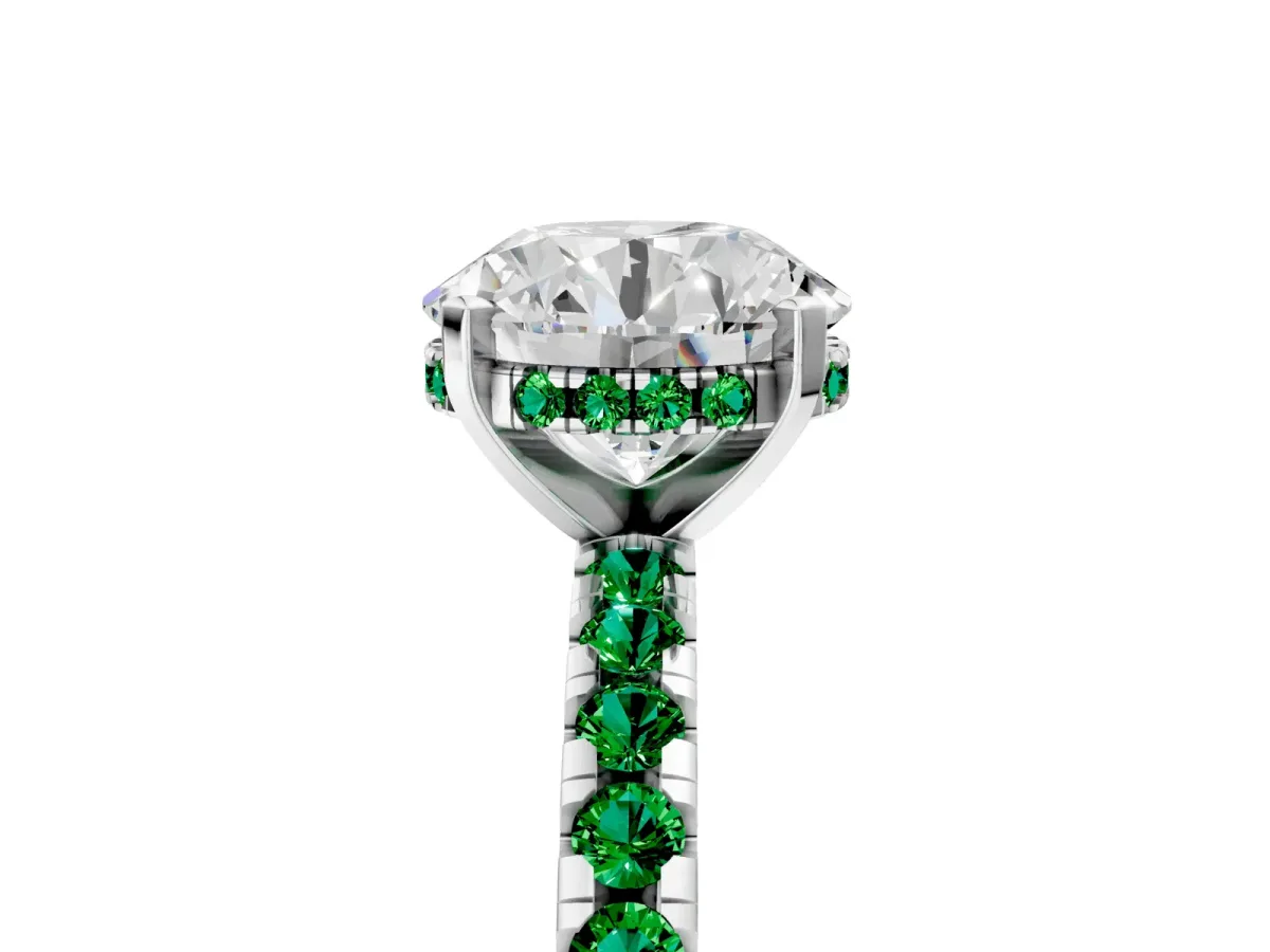 Round Cut Diamond Solitaire Ring with Round Emerald Pavé Band and Four-Prong Setting Silver