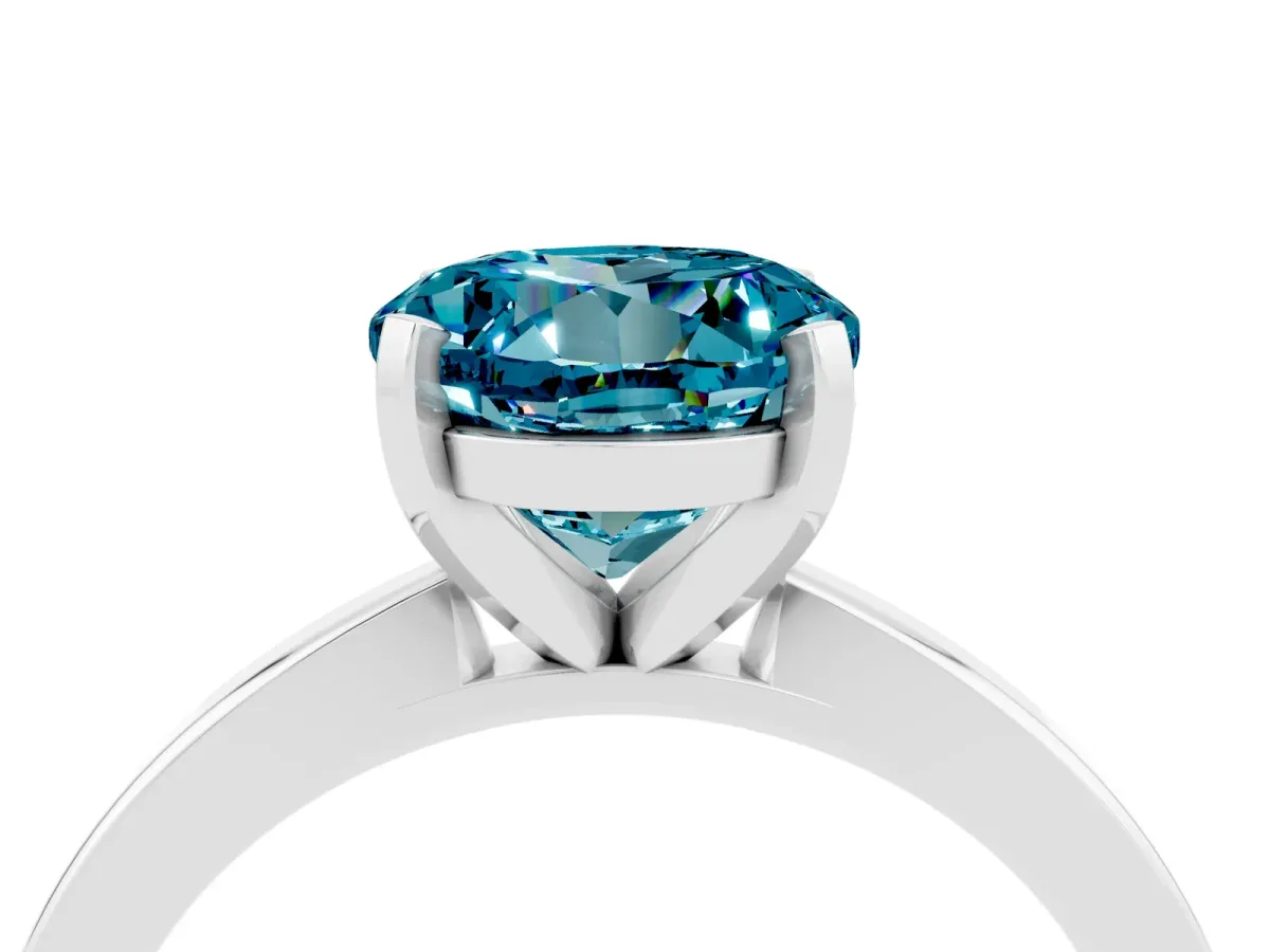 Round Cut Blue Topaz Solitaire Engagement Ring with Classic Band and Four-Prong Setting Silver