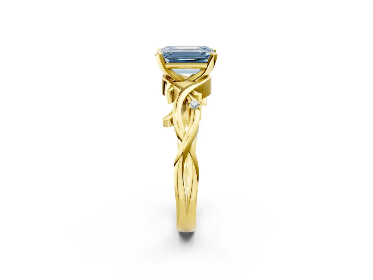 Fancy Blue Emerald Cut Diamond Solitaire Ring with Twisted Band and Prong Setting Yellow gold