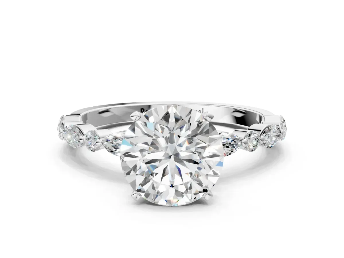 Round Cut Diamond Ring with Marquise and Round Side Stones and Four-Prong Setting Silver