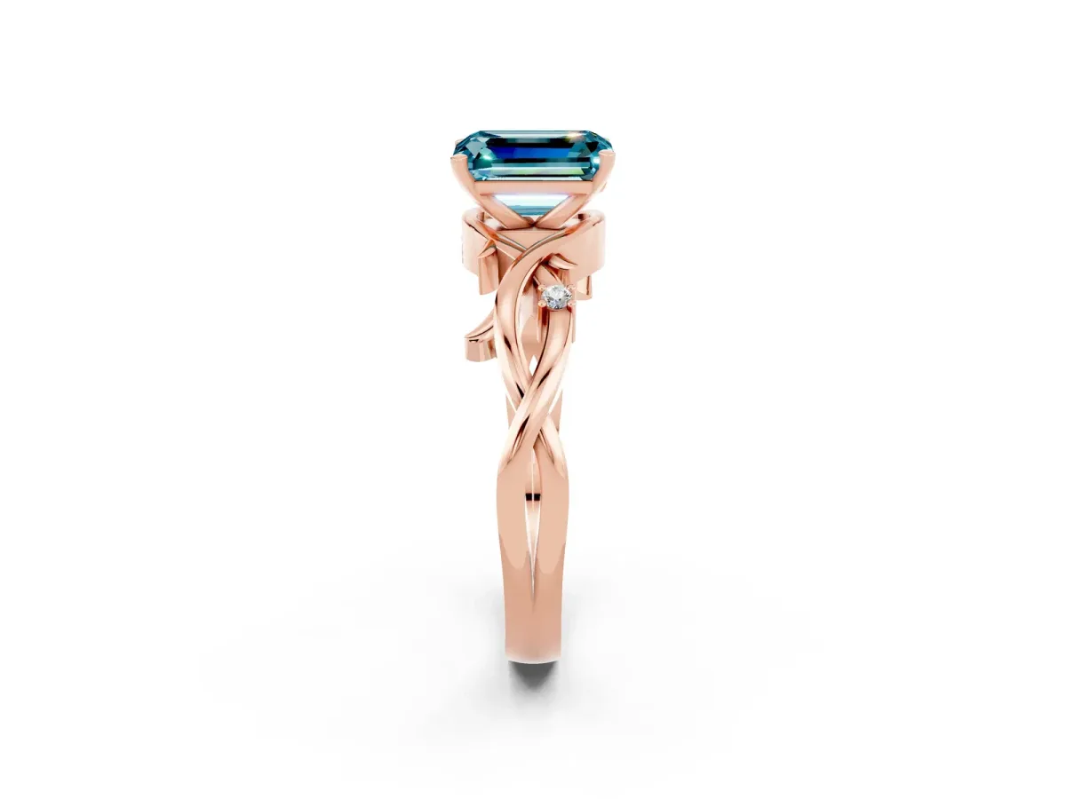 Emerald Cut Blue Topaz Solitaire Ring with Twisted Band and Prong Setting Rose gold