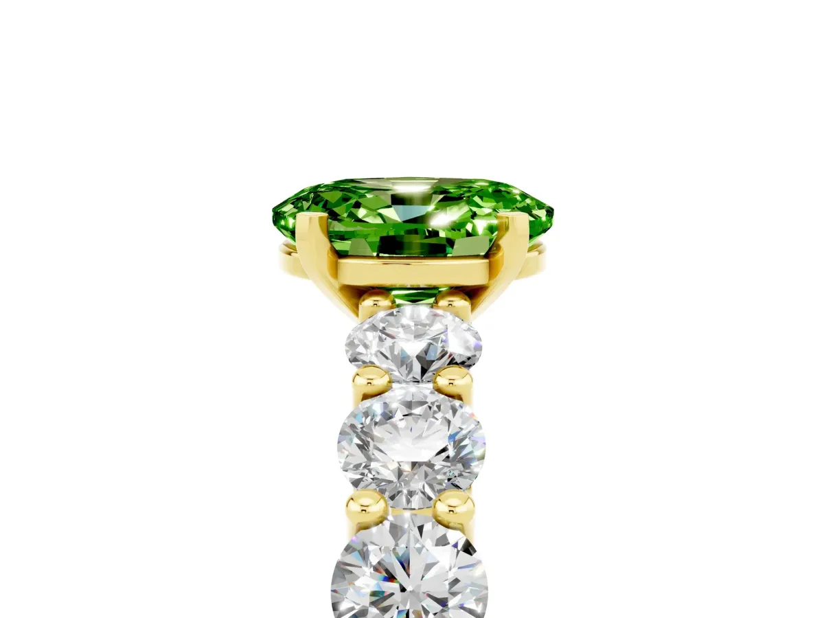 Oval Cut Peridot Prong Setting with Side Stones on a Pave Band Yellow gold