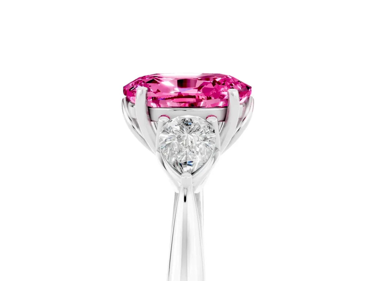 Three-Stone Oval Cut Pink Sapphire Ring with Pear Side Stones in Four-Prong Setting White gold
