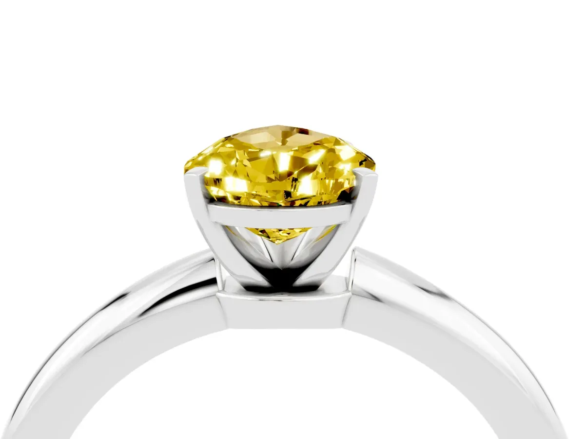 Pear Cut Yellow Sapphire Solitaire Ring with Six-Prong Setting and Classic Band Silver