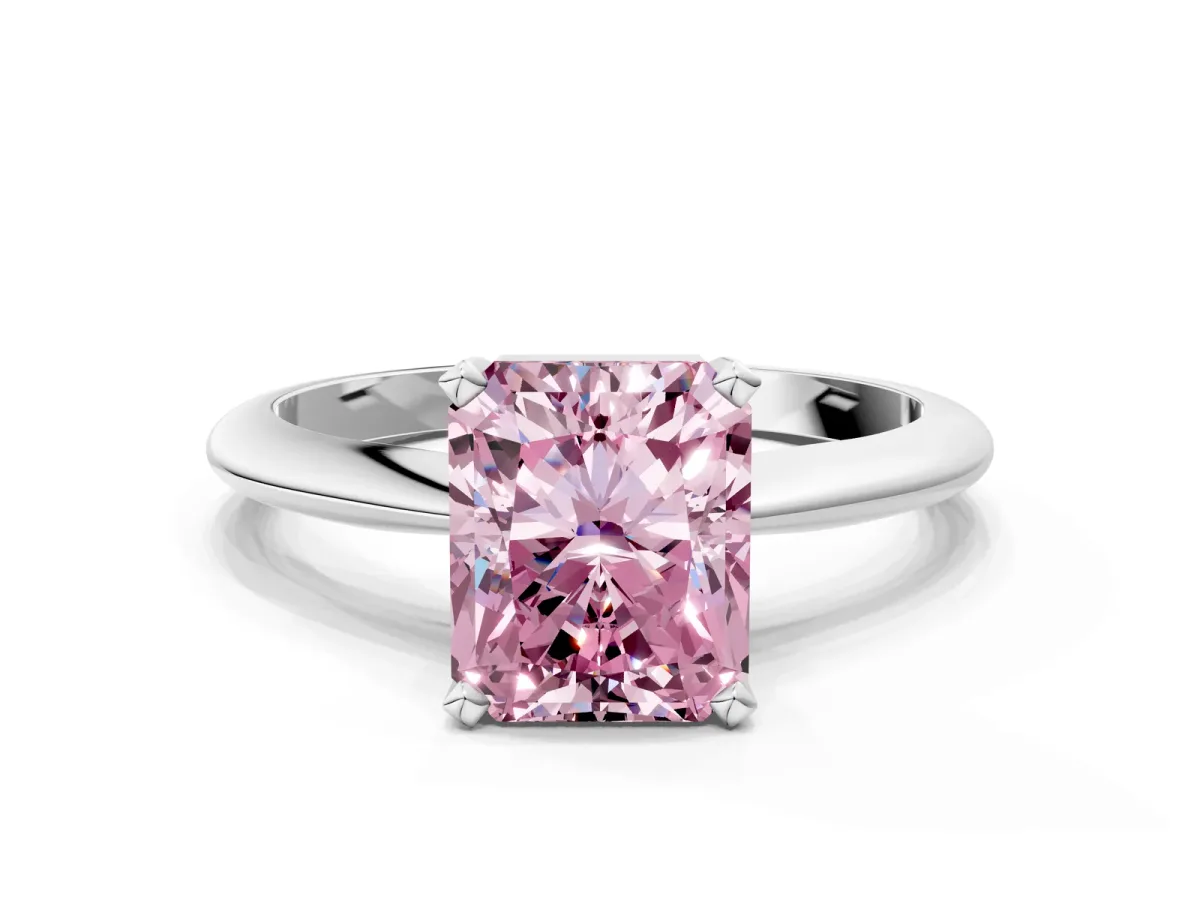 Fancy Pink Radiant Cut Cut Solitaire Ring with Four-Prong Setting on a Classic Band Platinum