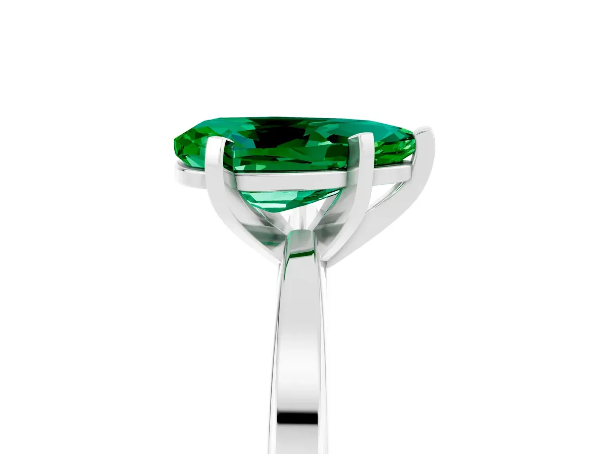 Pear Cut Emerald Solitaire Engagement Ring with Classic Band and Four-Prong Setting Silver