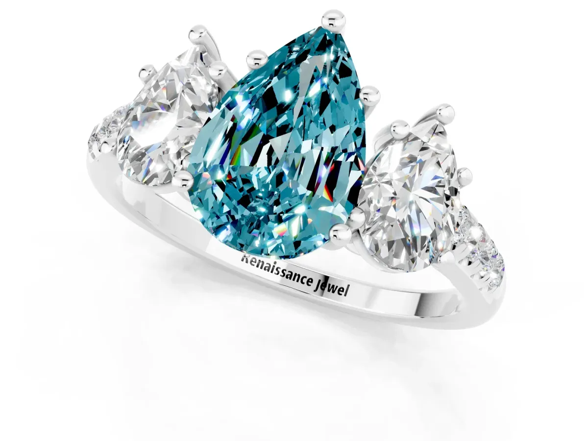 Three-Stone Pear Cut Blue Topaz Ring with Round Pavé Band and Prong Setting Silver