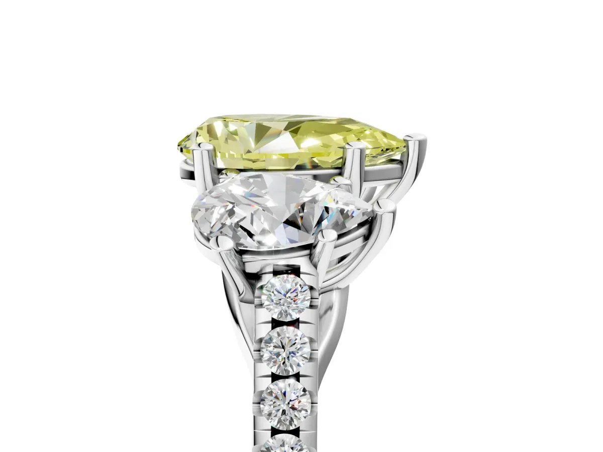 Fancy Yellow Three-Stone Pear Cut Diamond Ring with Round Pavé Band and Prong Setting Silver