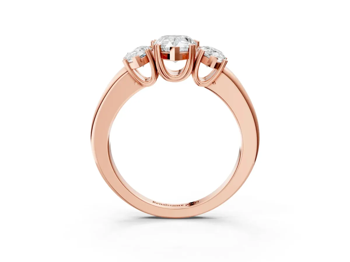 Three-Stone Pear Cut Cut Diamond Ring with Channel Set Band and Four-Prong Setting Rose gold