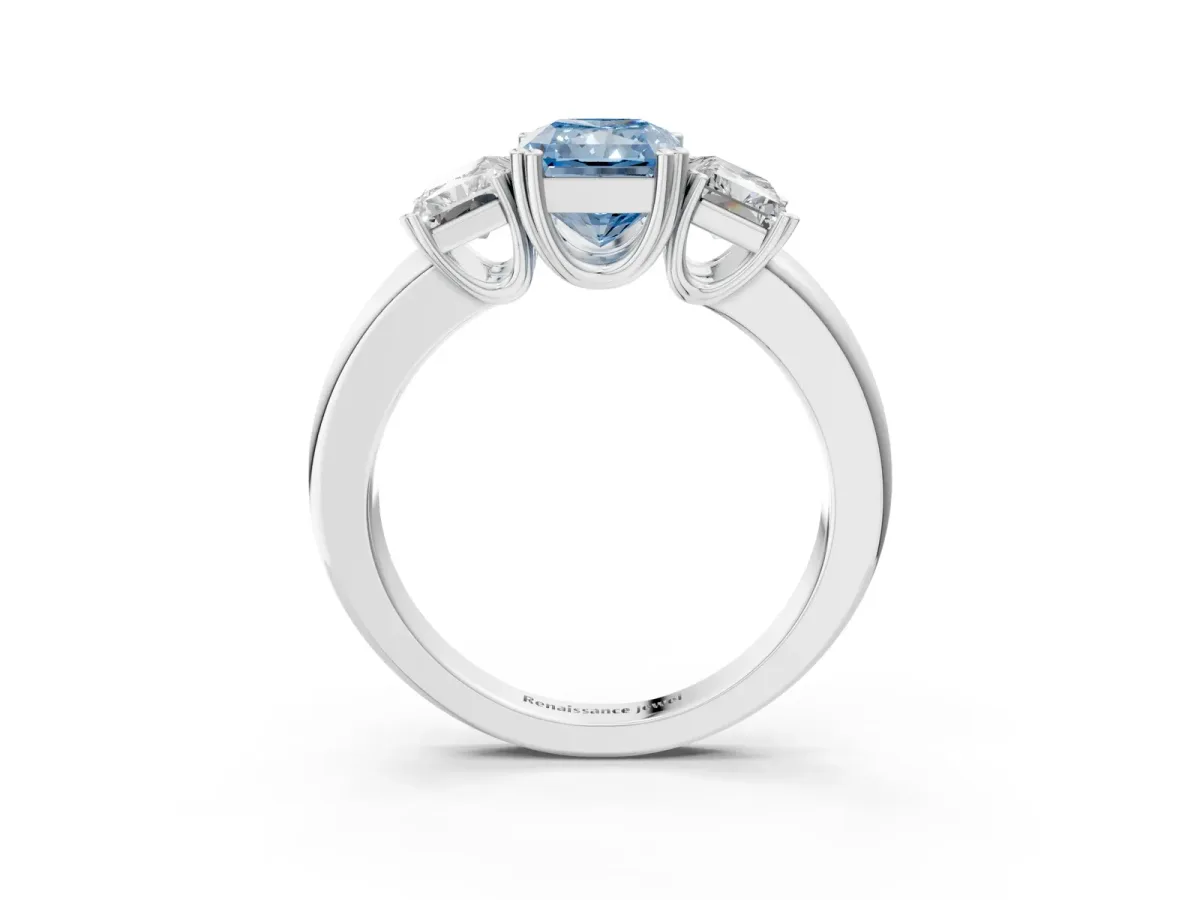 Fancy Blue Three-Stone Radiant Cut Cut Diamond Ring with Channel Set Band and Four-Prong Setting Silver