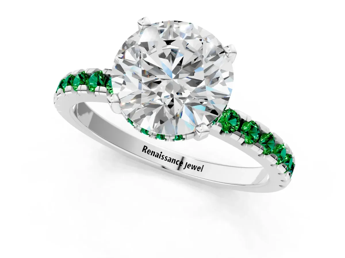 Round Cut Diamond Solitaire Ring with Round Emerald Pavé Band and Four-Prong Setting Silver
